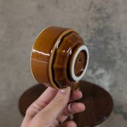 Trio of brown stoneware cups