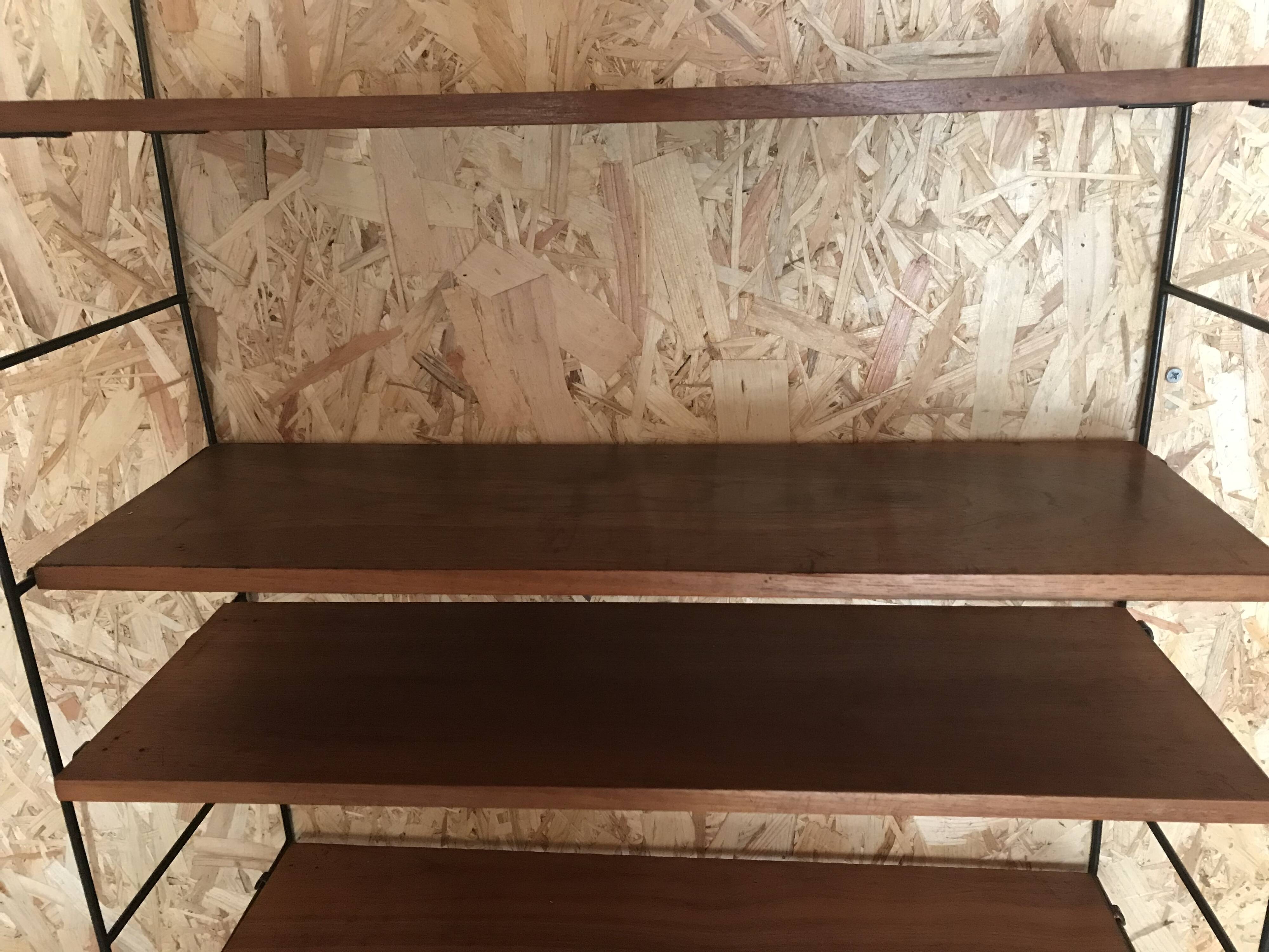 Vintage four-tier string wall shelf