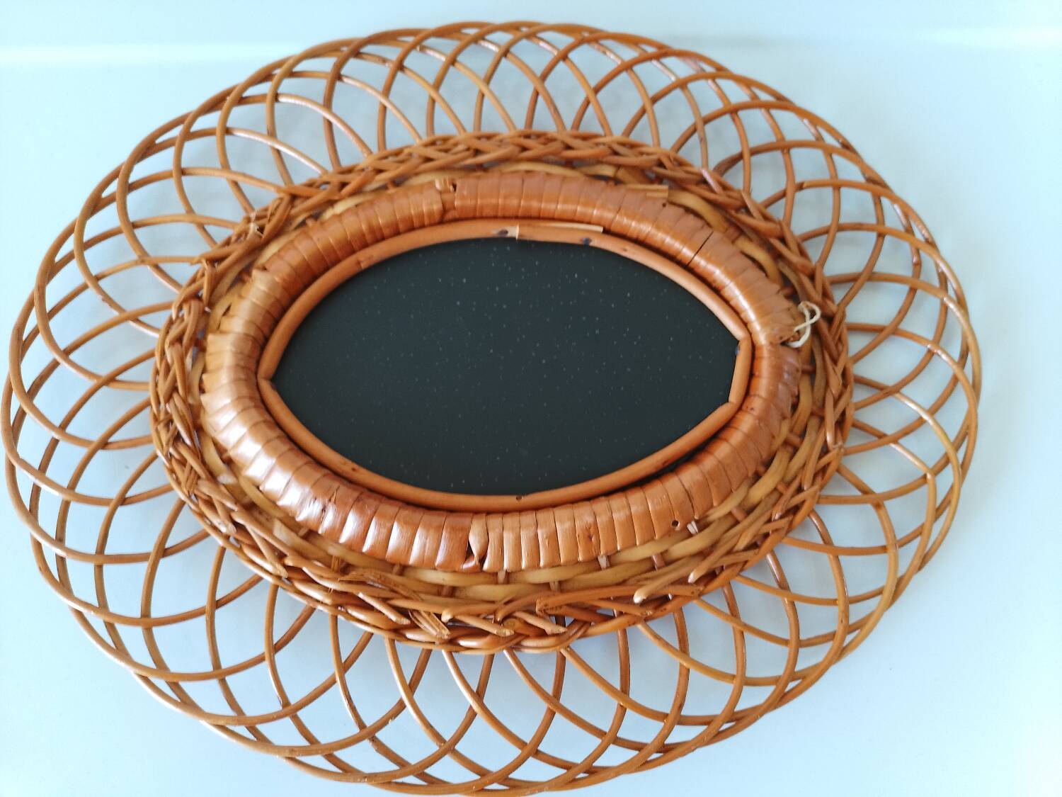 Woven rattan mirror