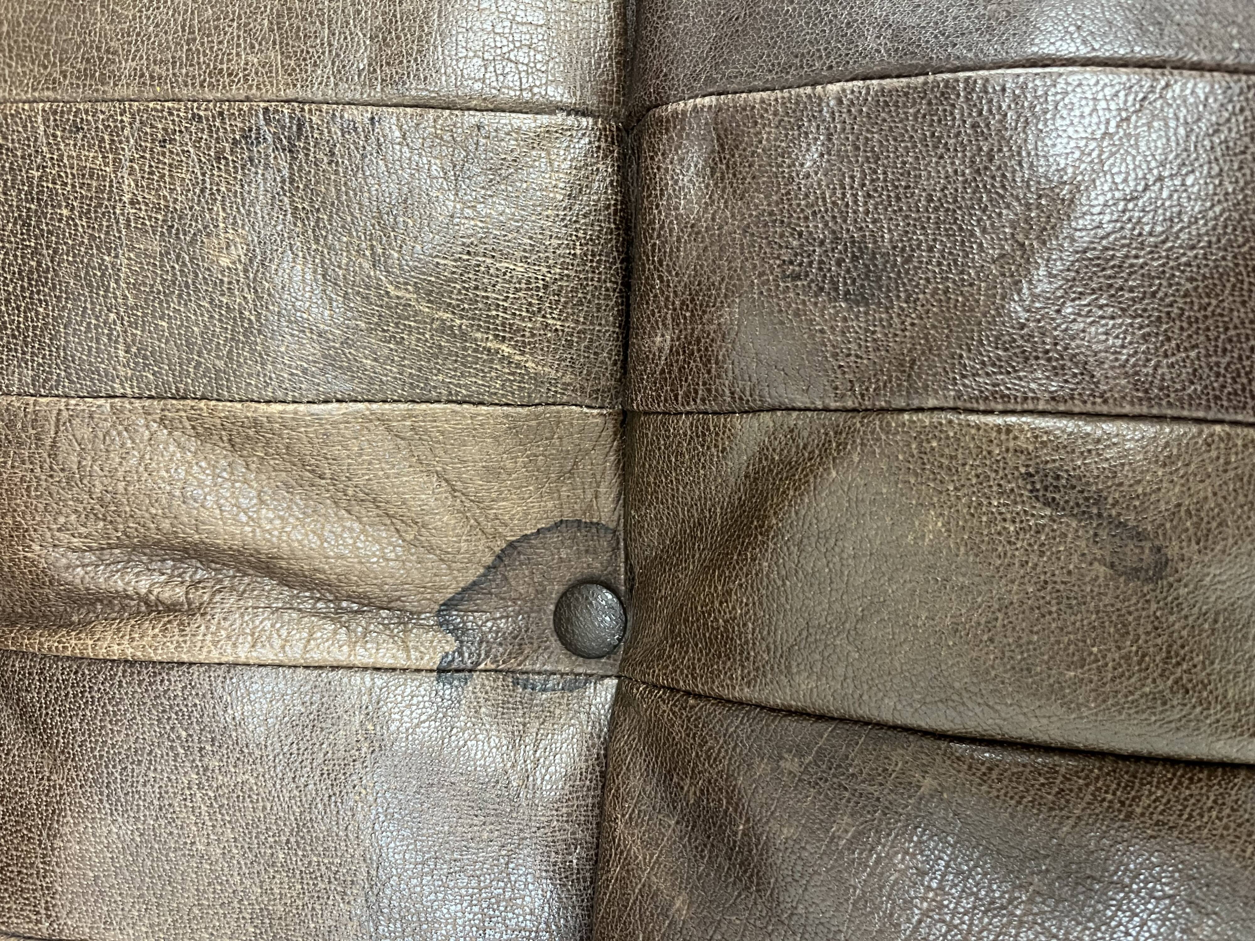 Living room sofa and brutalist armchairs in leather and wood, 70s, chalet style