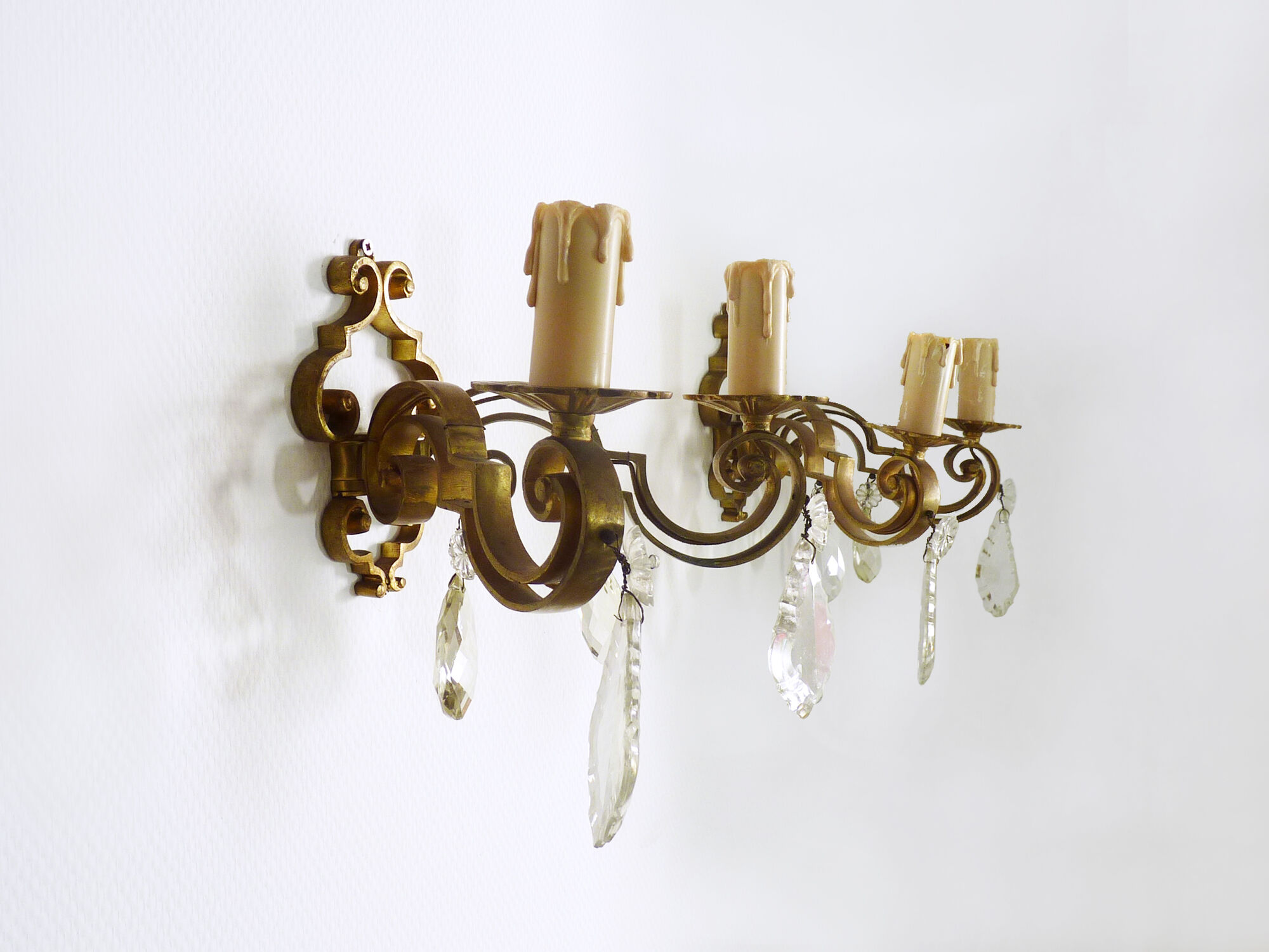Former pair bronze wall sconces with double lights and tassels. Art Deco period