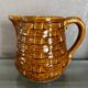 Digouin and Sarreguemines ceramic pitcher with braided decoration