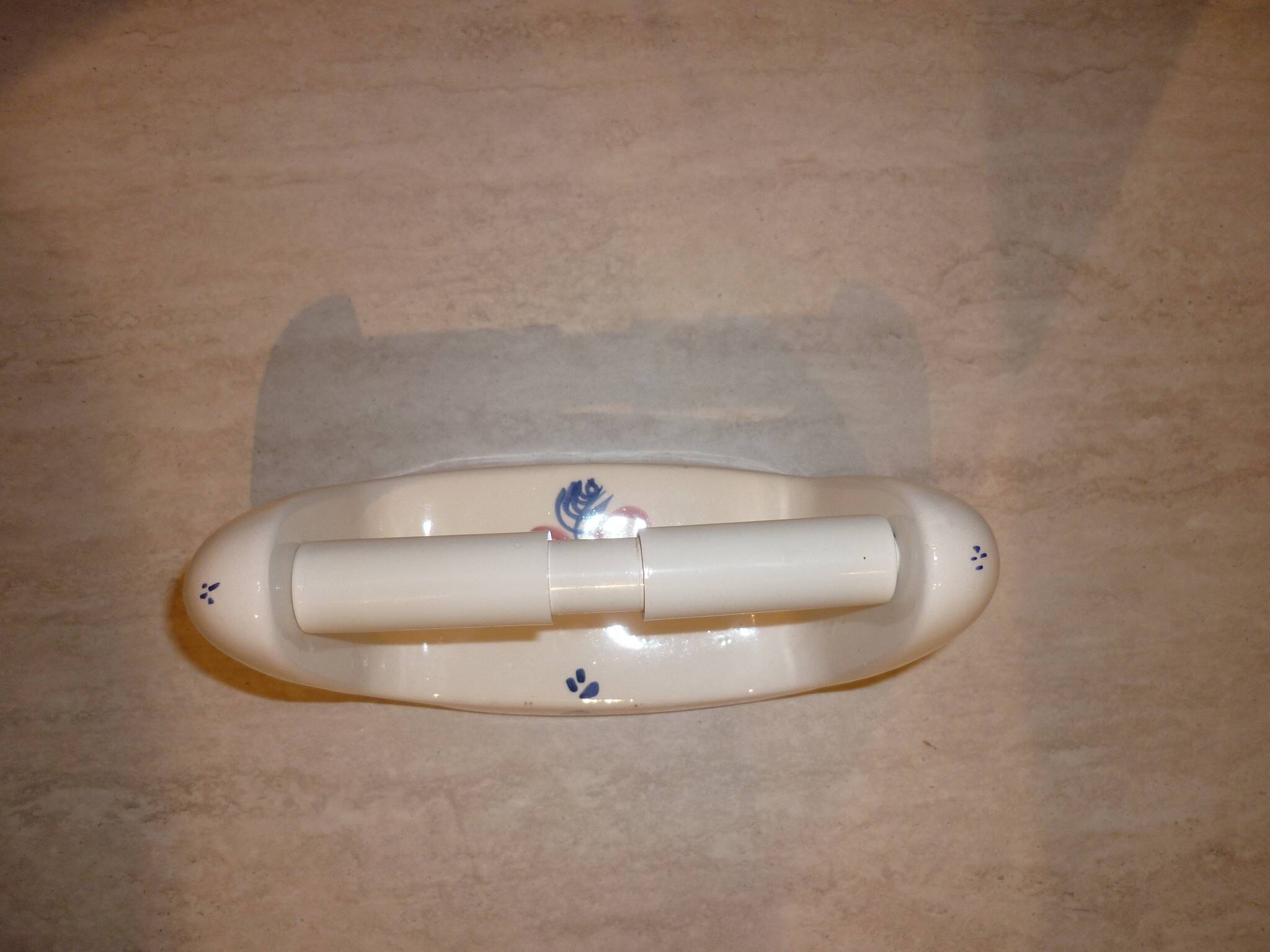 Wall-mounted ceramic toilet paper dispenser