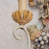 Mirror and its carved wooden sconces