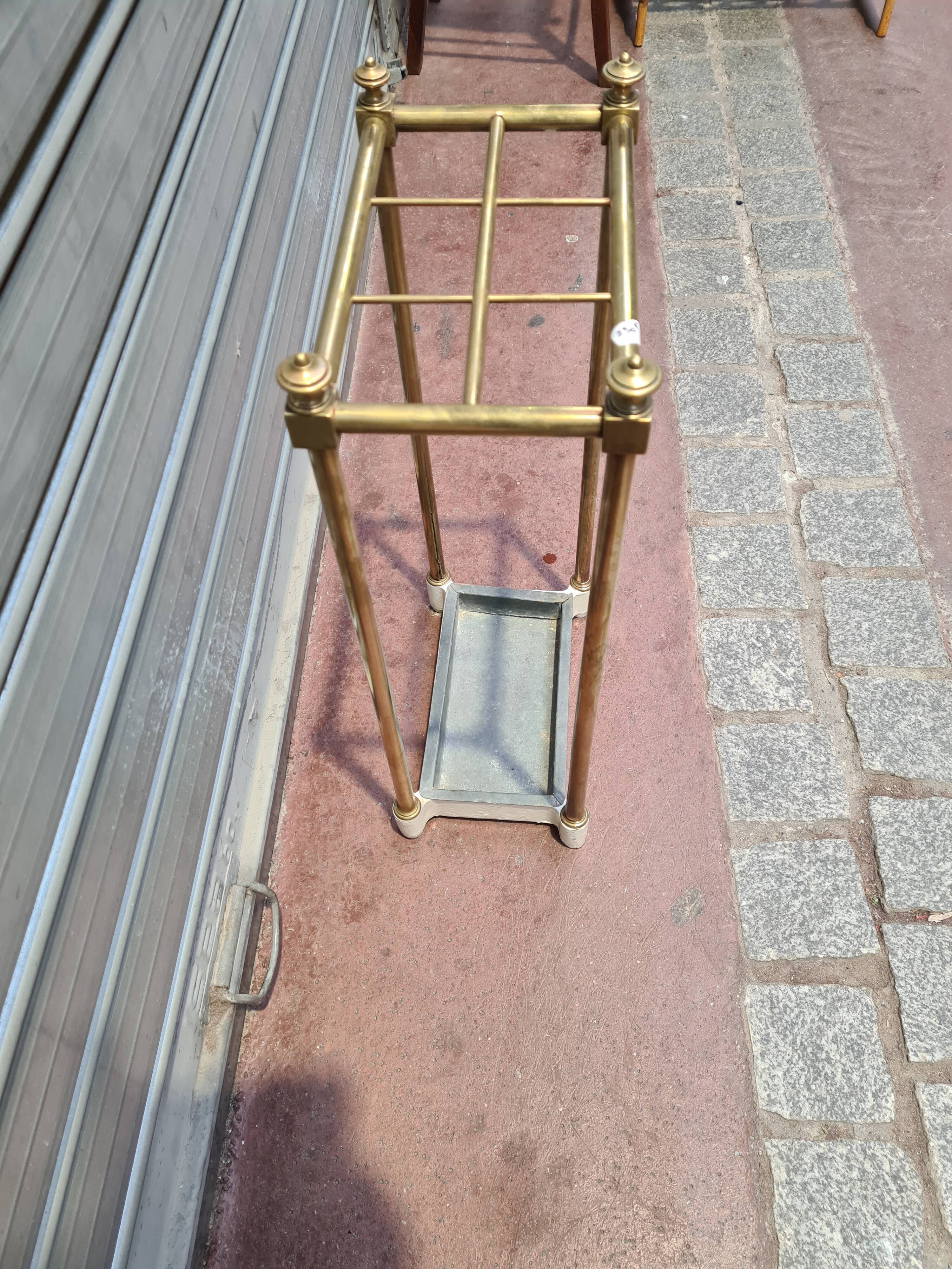 Old brass umbrella holder