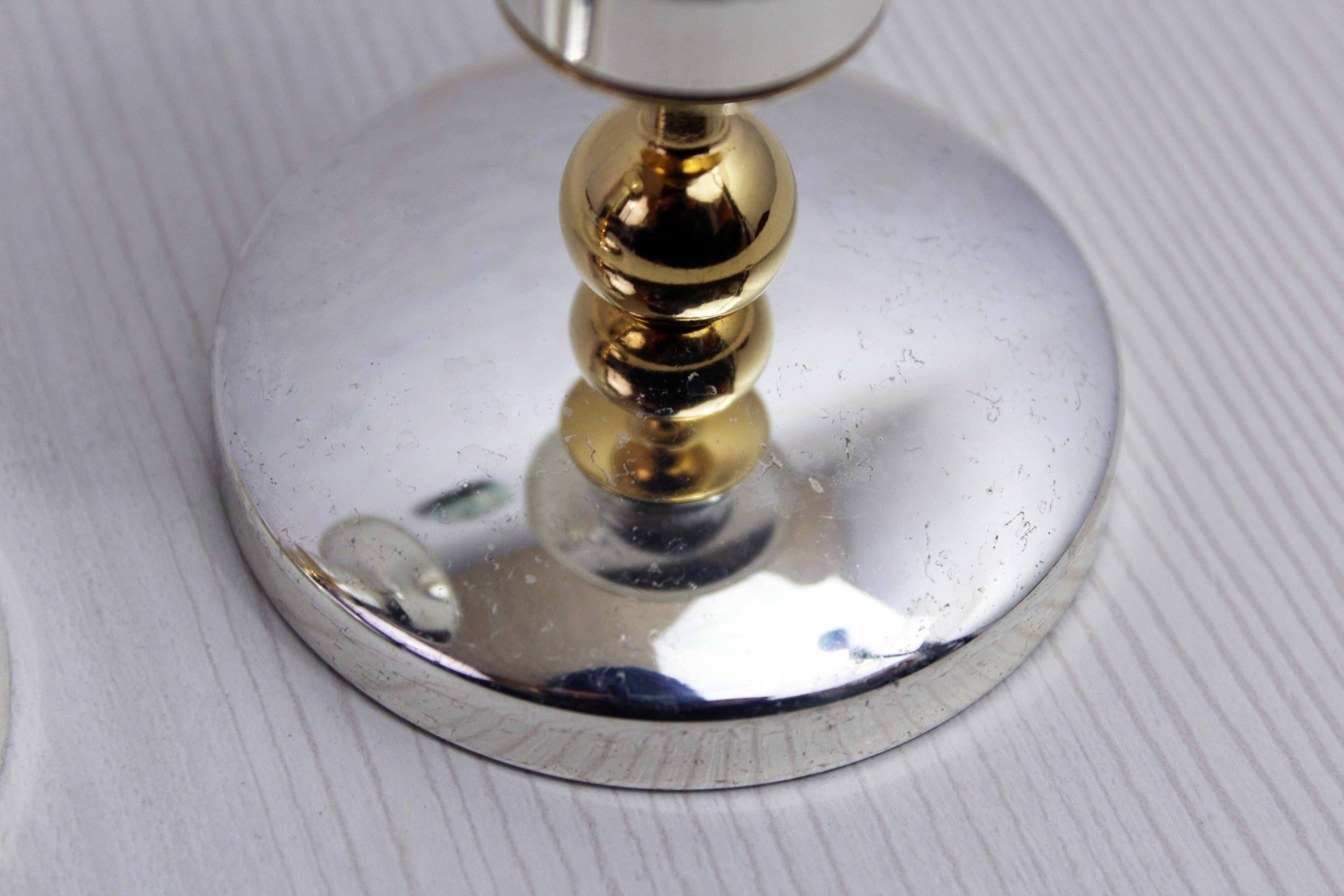 Pair of silver metal candlesticks