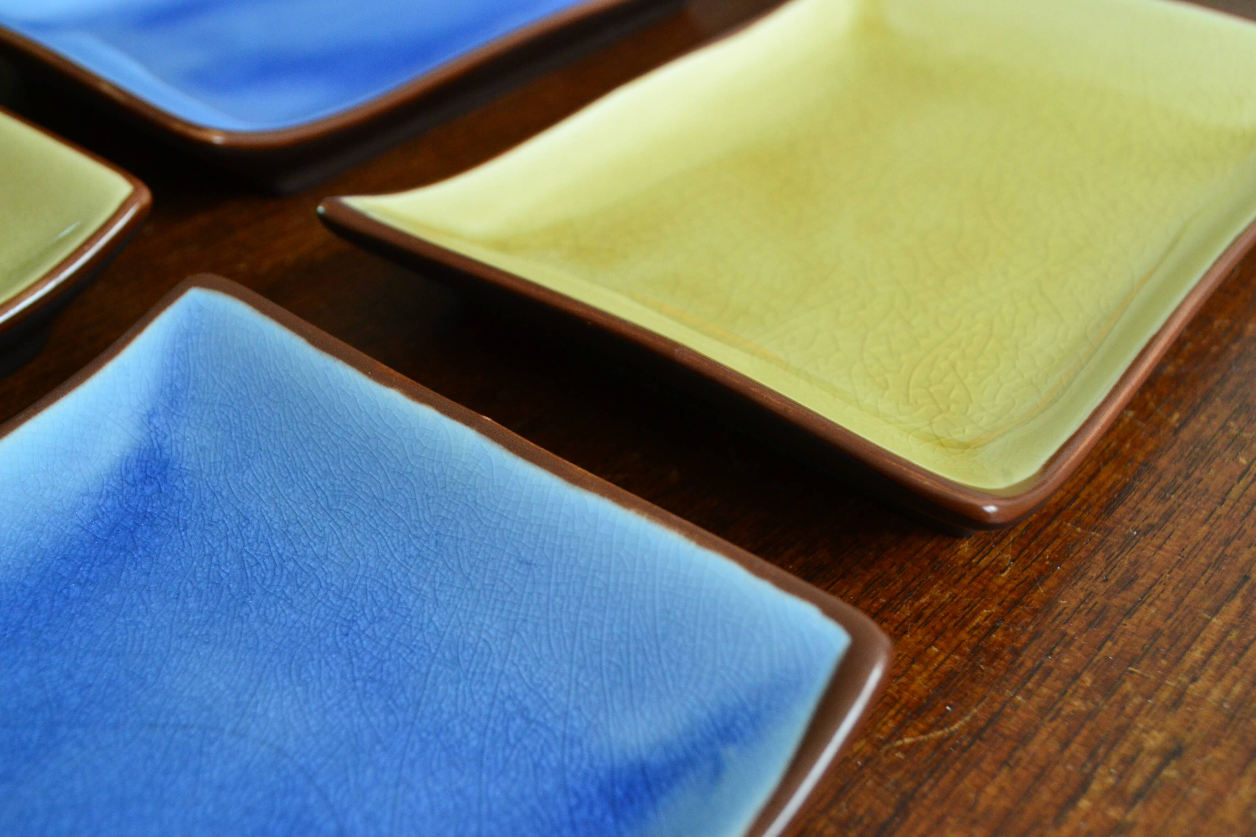 4 rectangular enameled ceramic cups