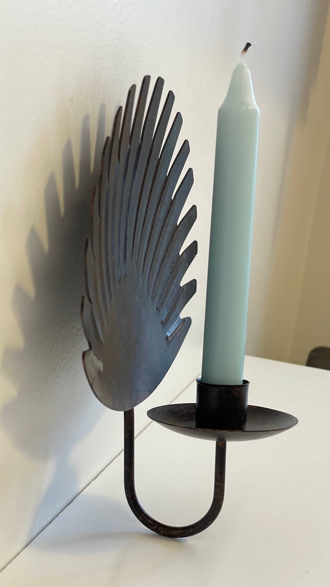 Brown patina wall candle holder