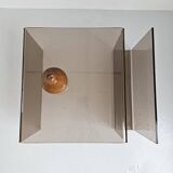 Smoked plexiglass magazine rack side table