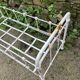 Old wrought iron doll bed