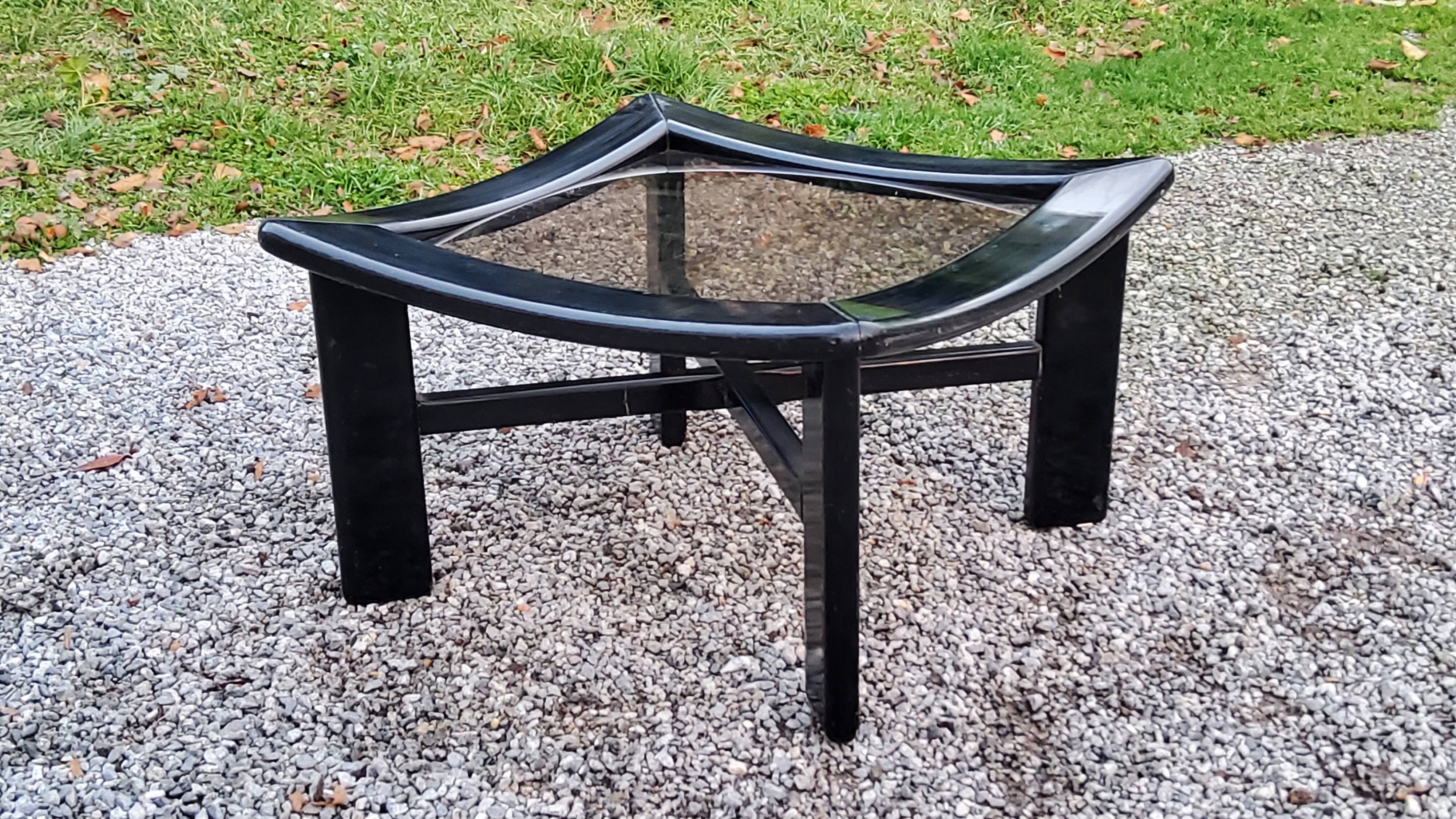 70s design coffee table in black lacquered wood with smoked glass top