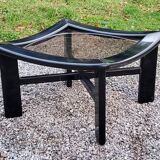70s design coffee table in black lacquered wood with smoked glass top