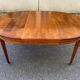 Round extendable dining table Louis XVI in cherry wood from the 1960s.