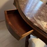 Violin-shaped oval pedestal table