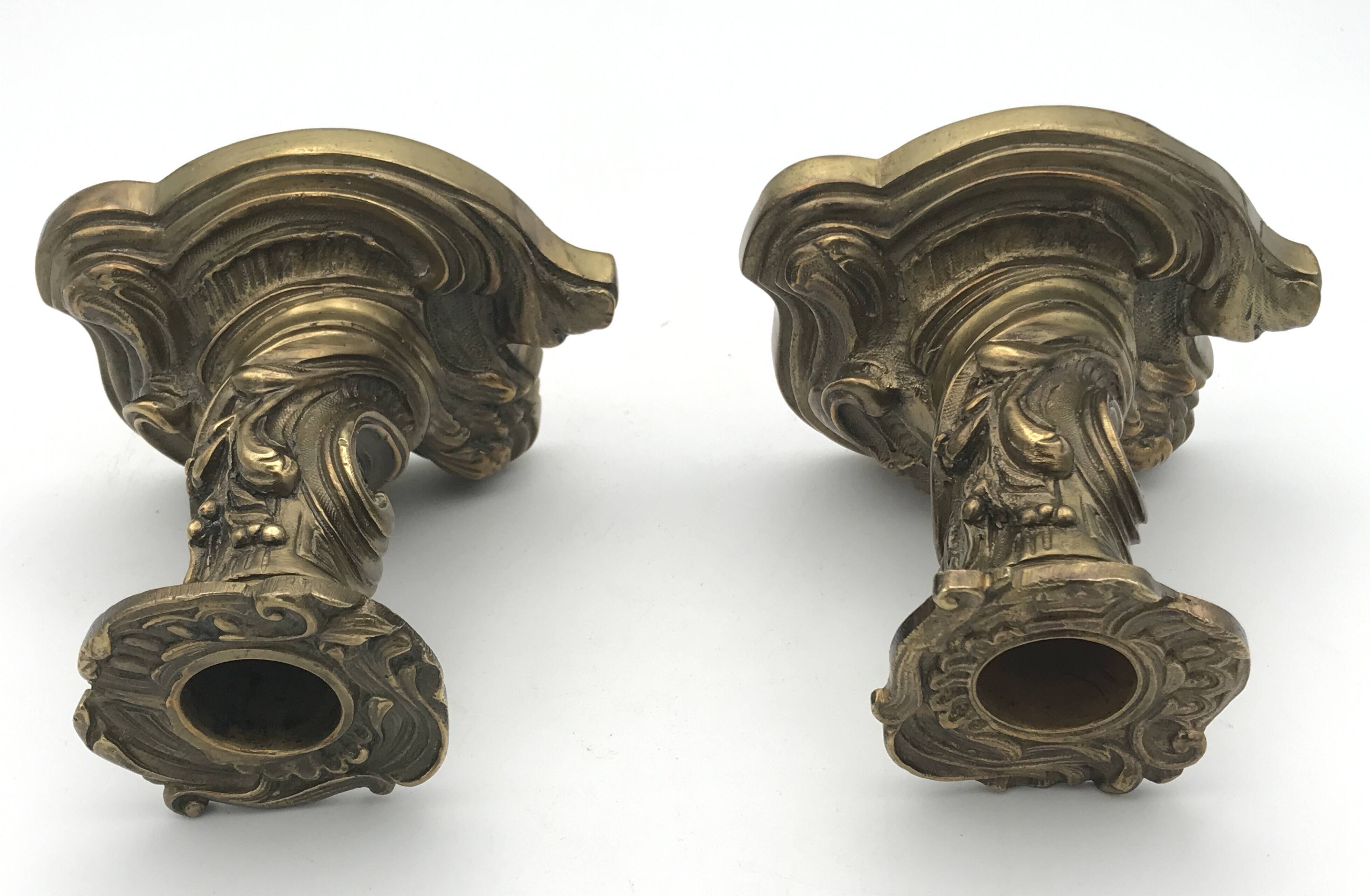 Pair of gilded bronze candlesticks with twisted decor and floral garlands, louis xv style