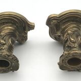 Pair of gilded bronze candlesticks with twisted decor and floral garlands, louis xv style