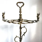 Italian brass umbrella stand, Art Nouveau style, with putti.