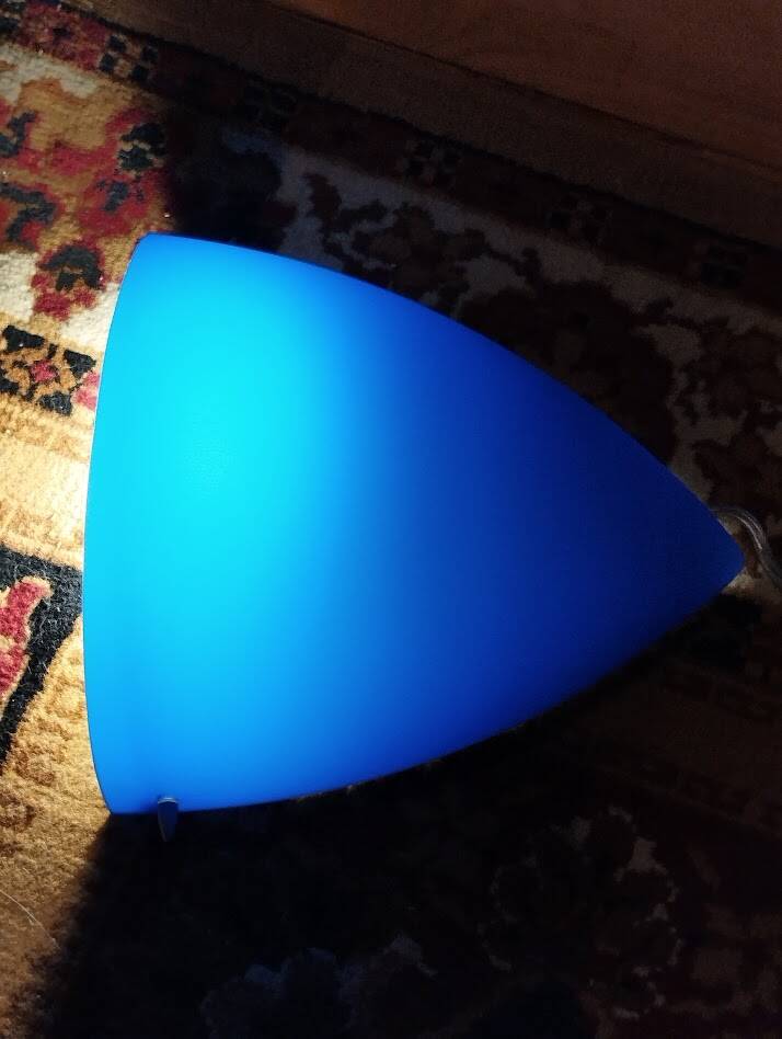 a pair of Ikea Kvintett wall lamps