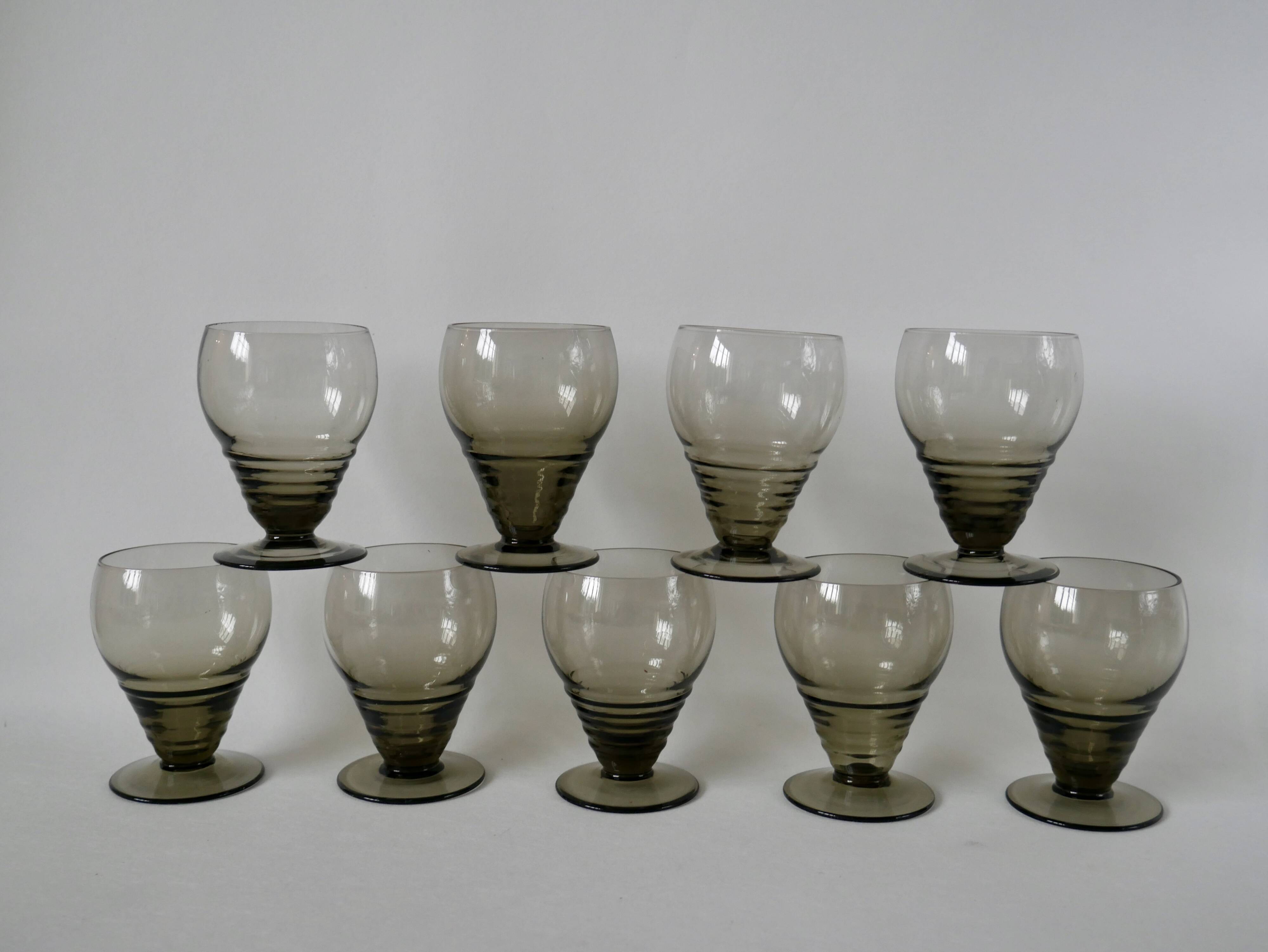 Set of 9 small art deco design liqueur glasses in smoked glass from the 30s and 40s