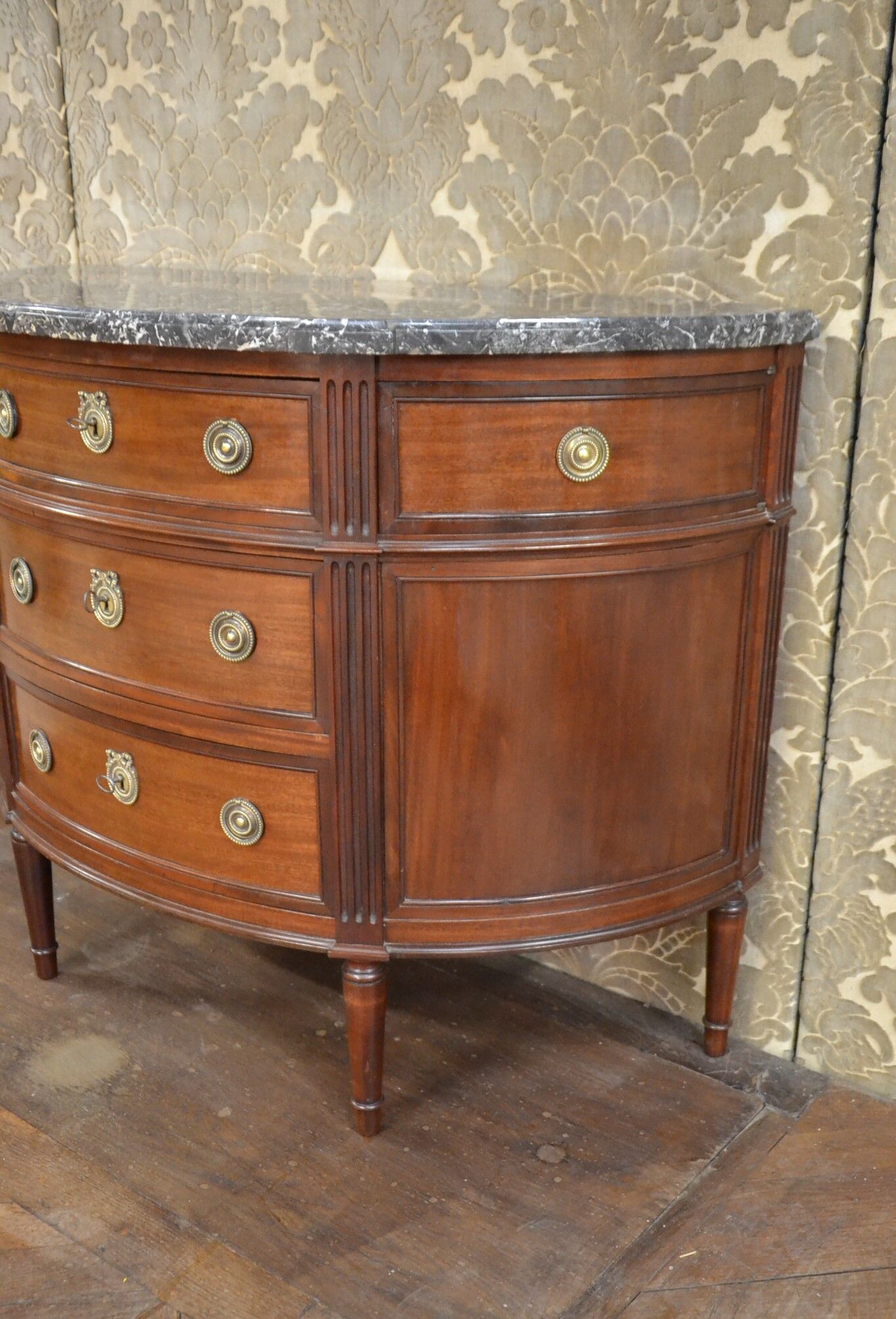 Louis XVI-style half-moon mahogany chest of drawers