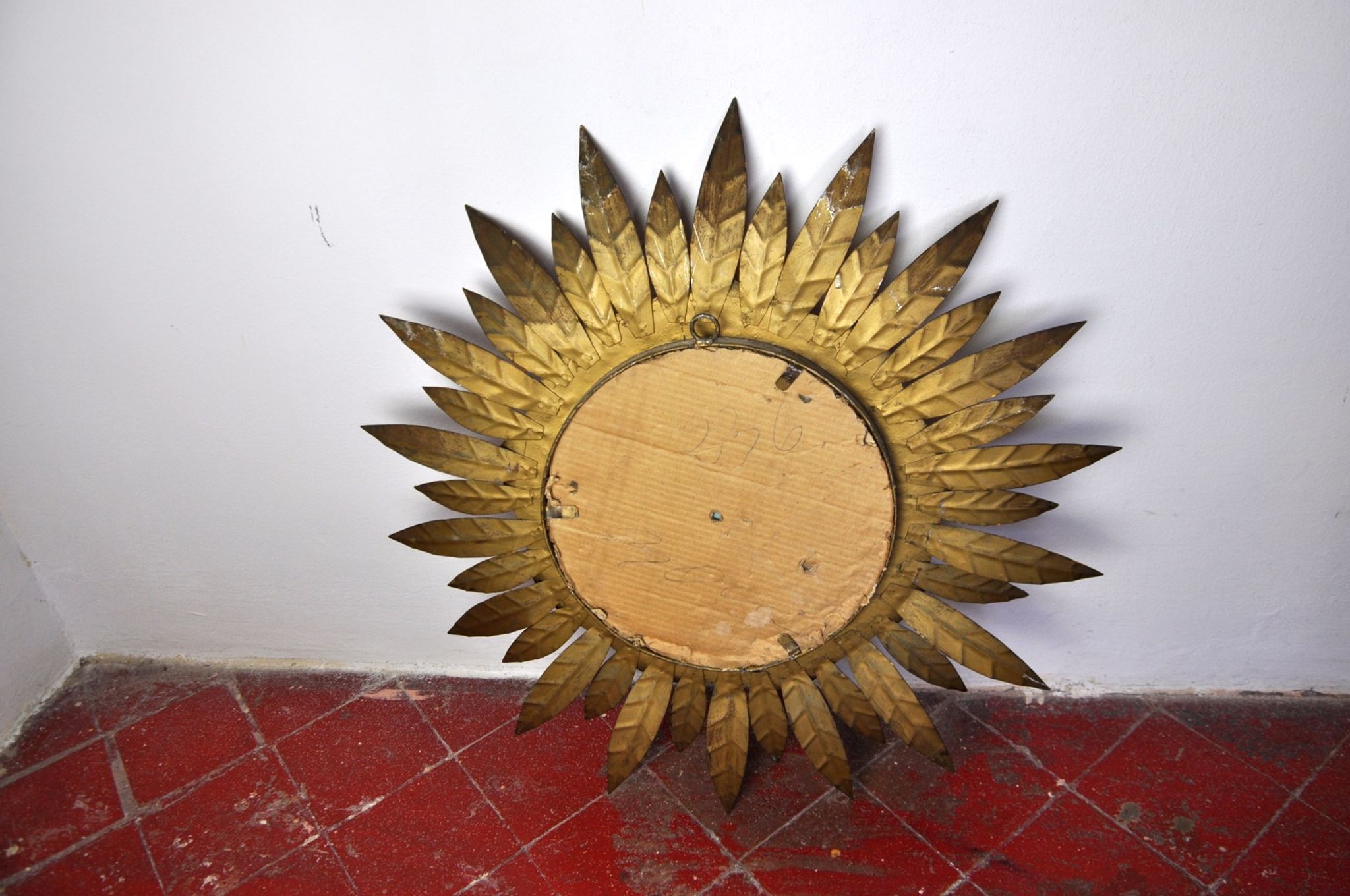 Miroir soleil, gilded metal with gold leaf, Italy, 1960