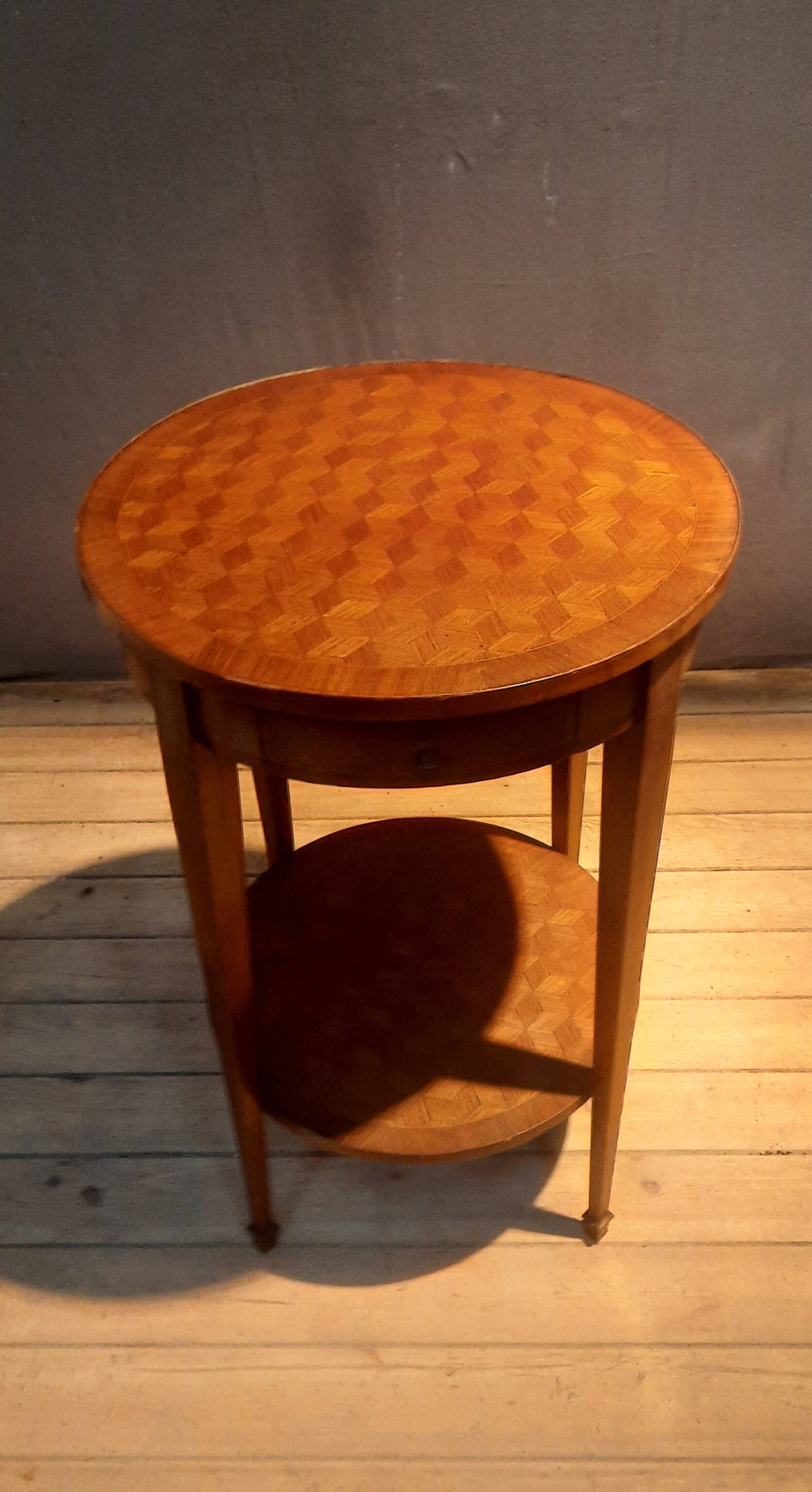 Round marquetry pedestal table with 2 shelves