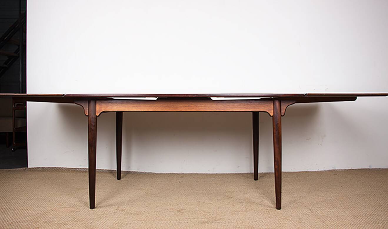 Danish extendable dining table in rosewood, model 54 by Gunni Omann