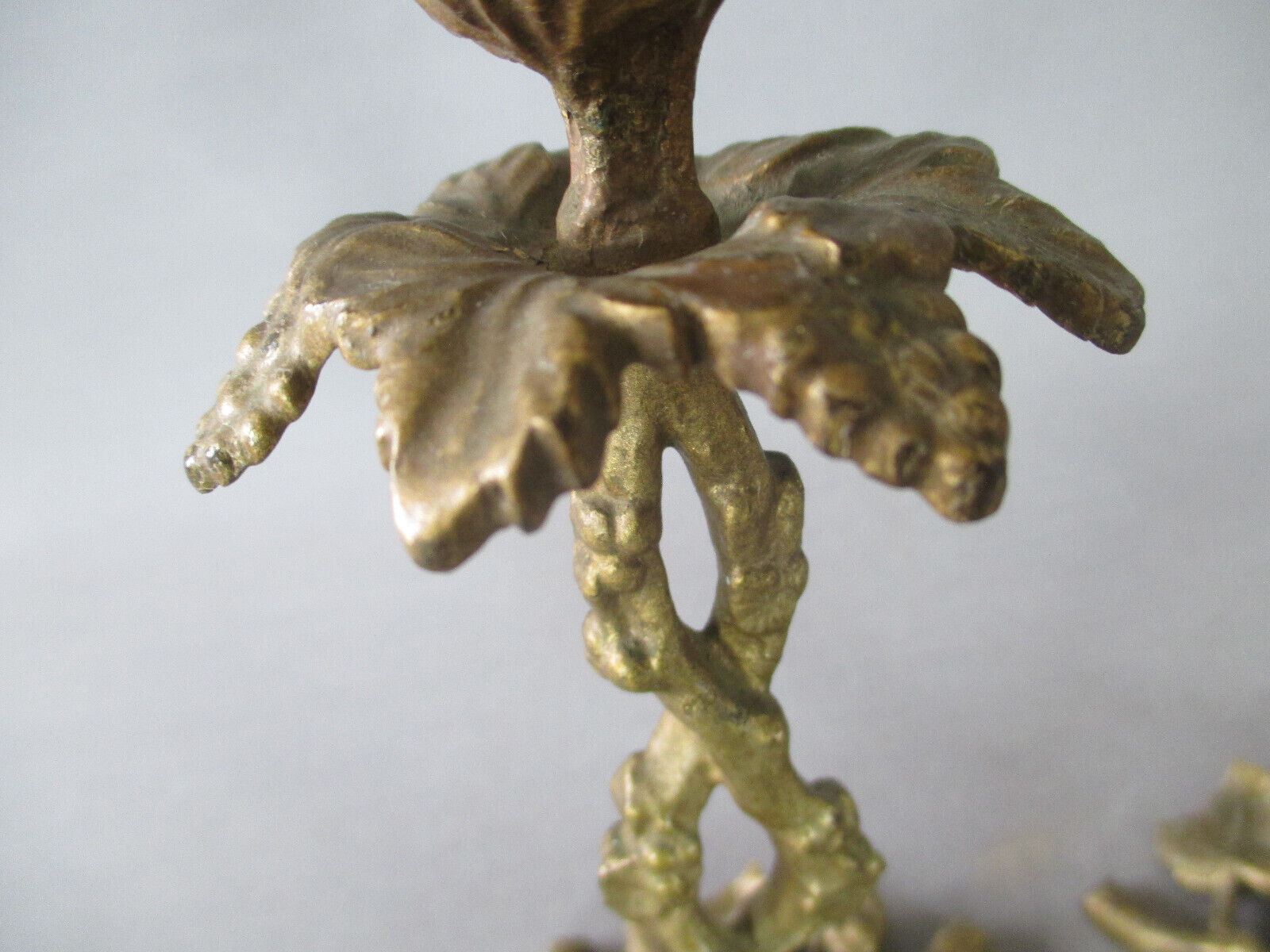 Pair of gilded bronze candlesticks with vine décor