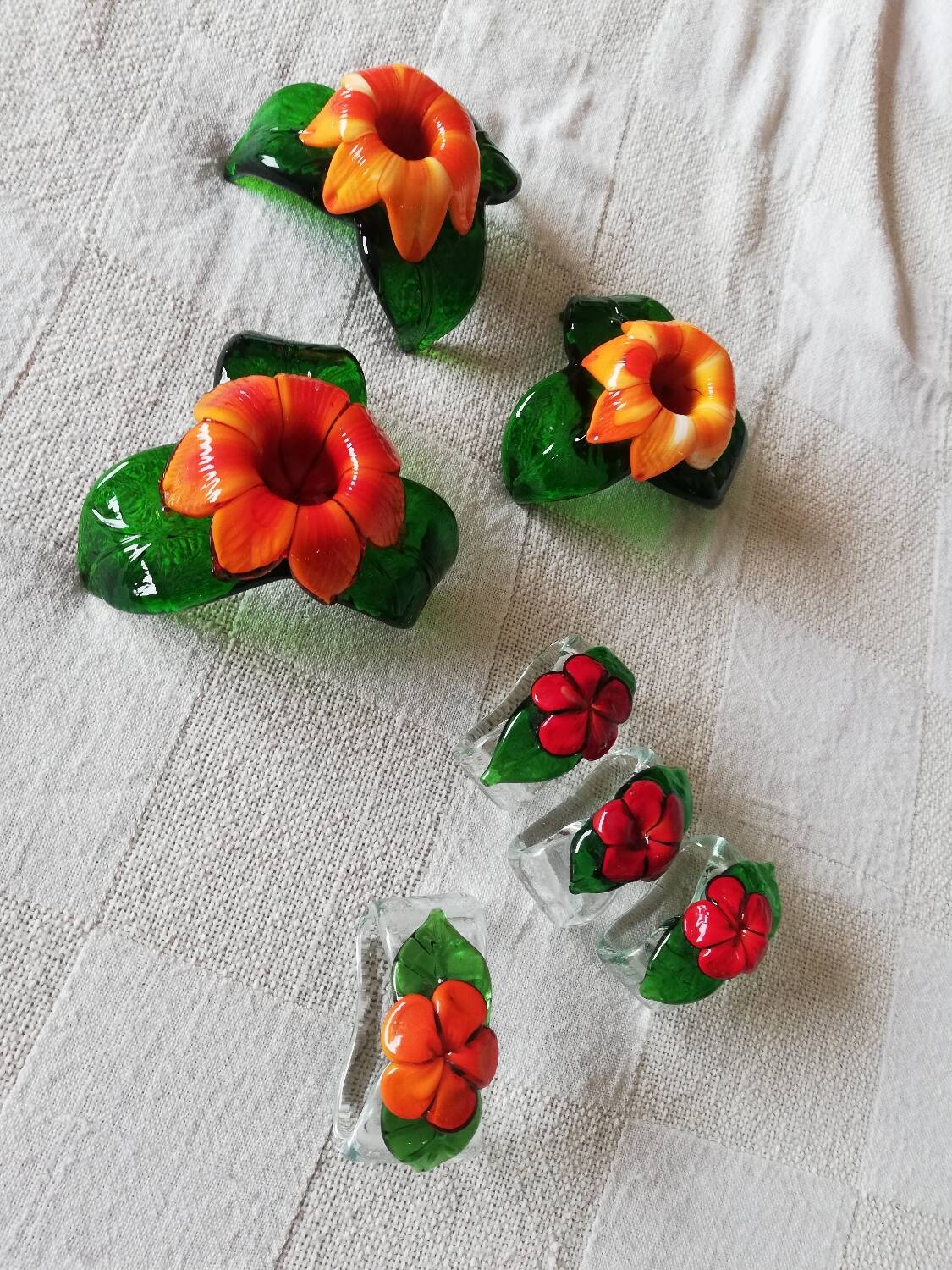 Lot of three Murano flower candle holders.