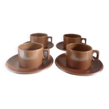 Stoneware coffee cups and saucers