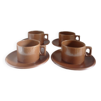 Stoneware coffee cups and saucers
