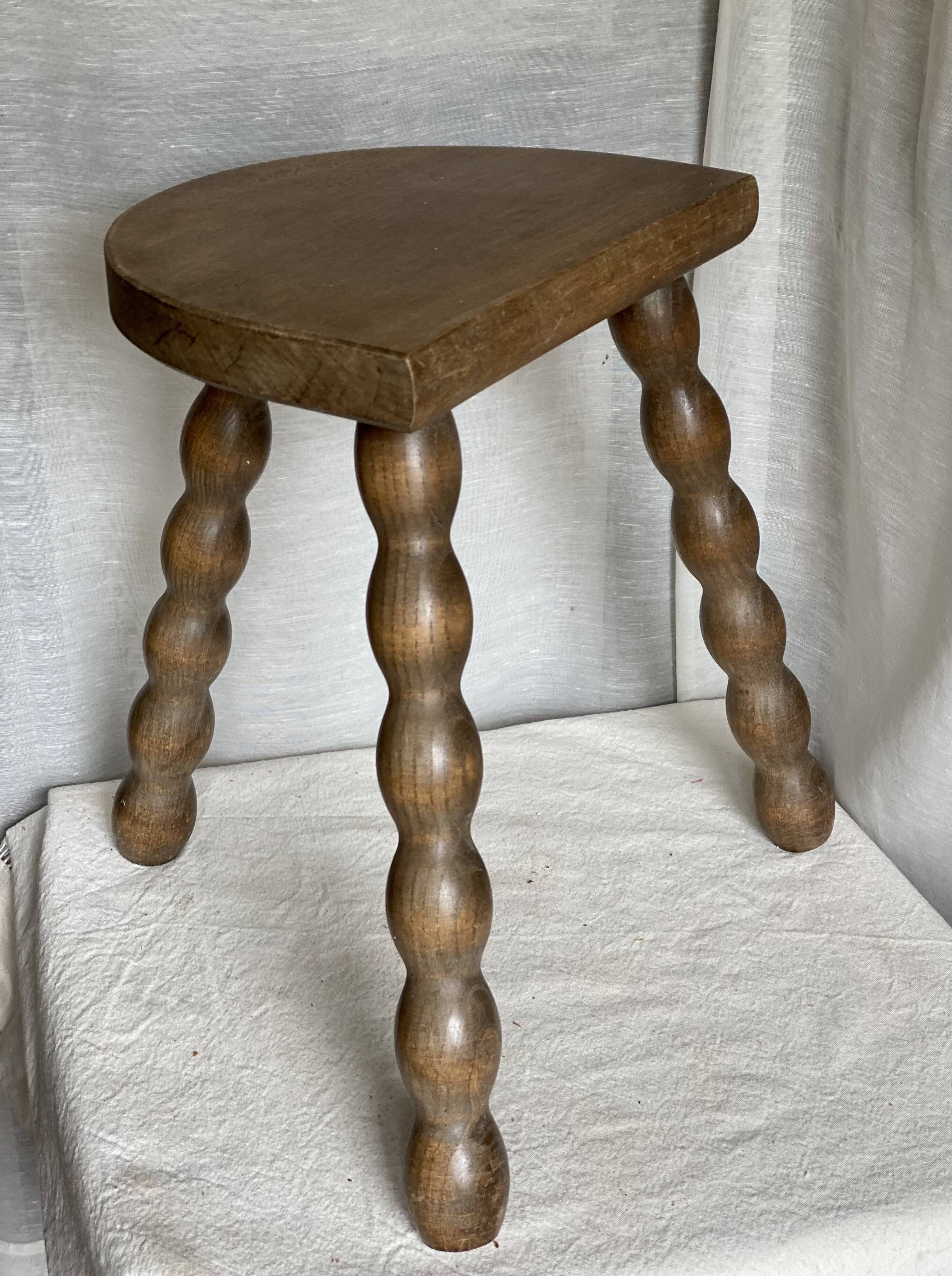 Vintage 1950s half-moon tripod stool