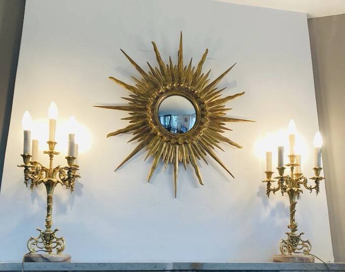 Pair of gilt bronze chandeliers, marble bases.