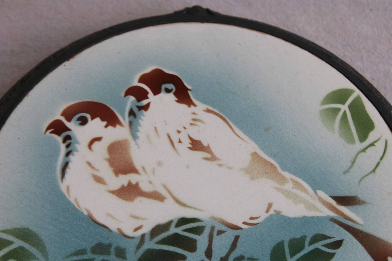 Antique ceramic trivet