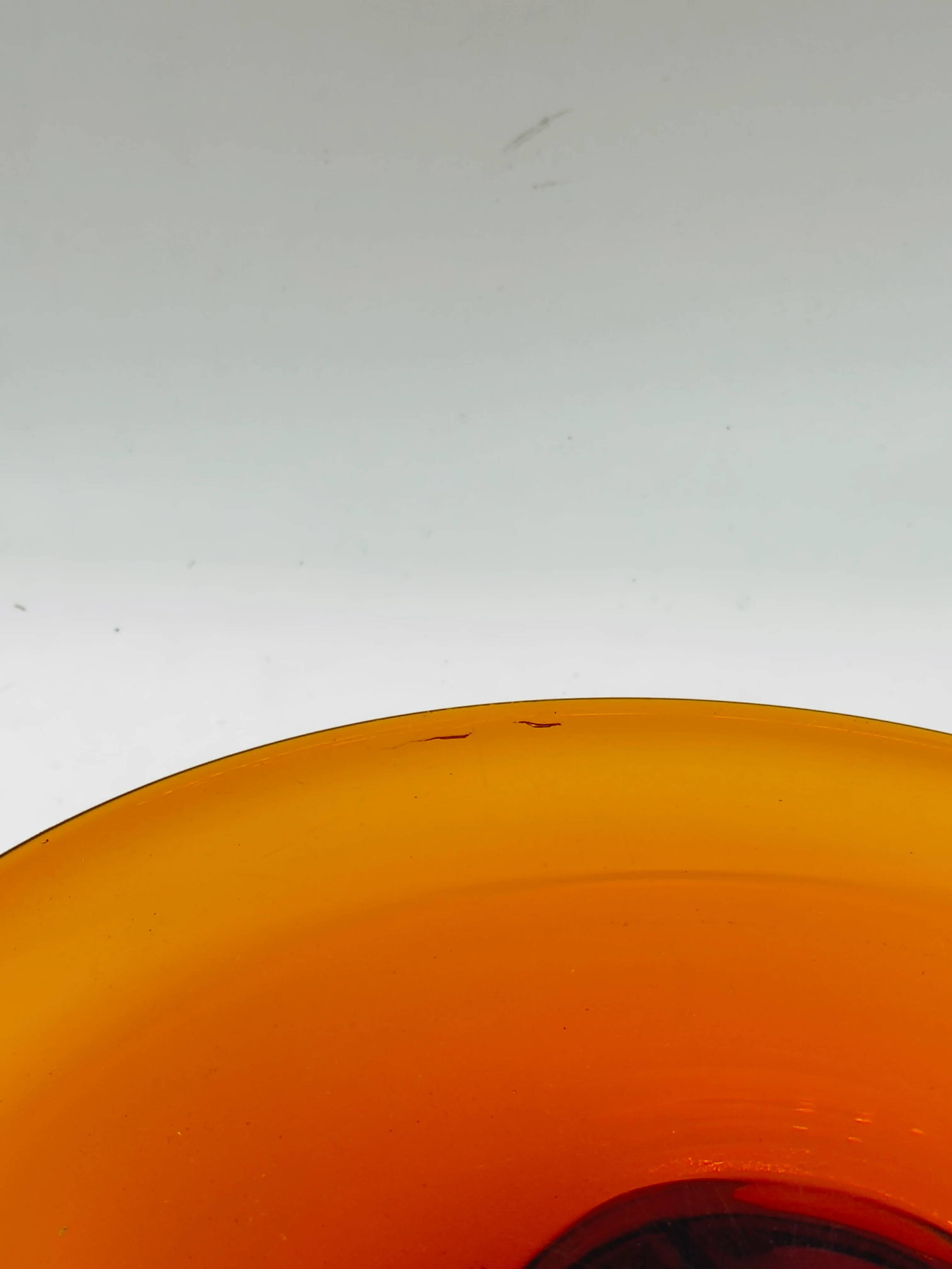 Vintage amber glass centrepiece bowl on a pedestal.