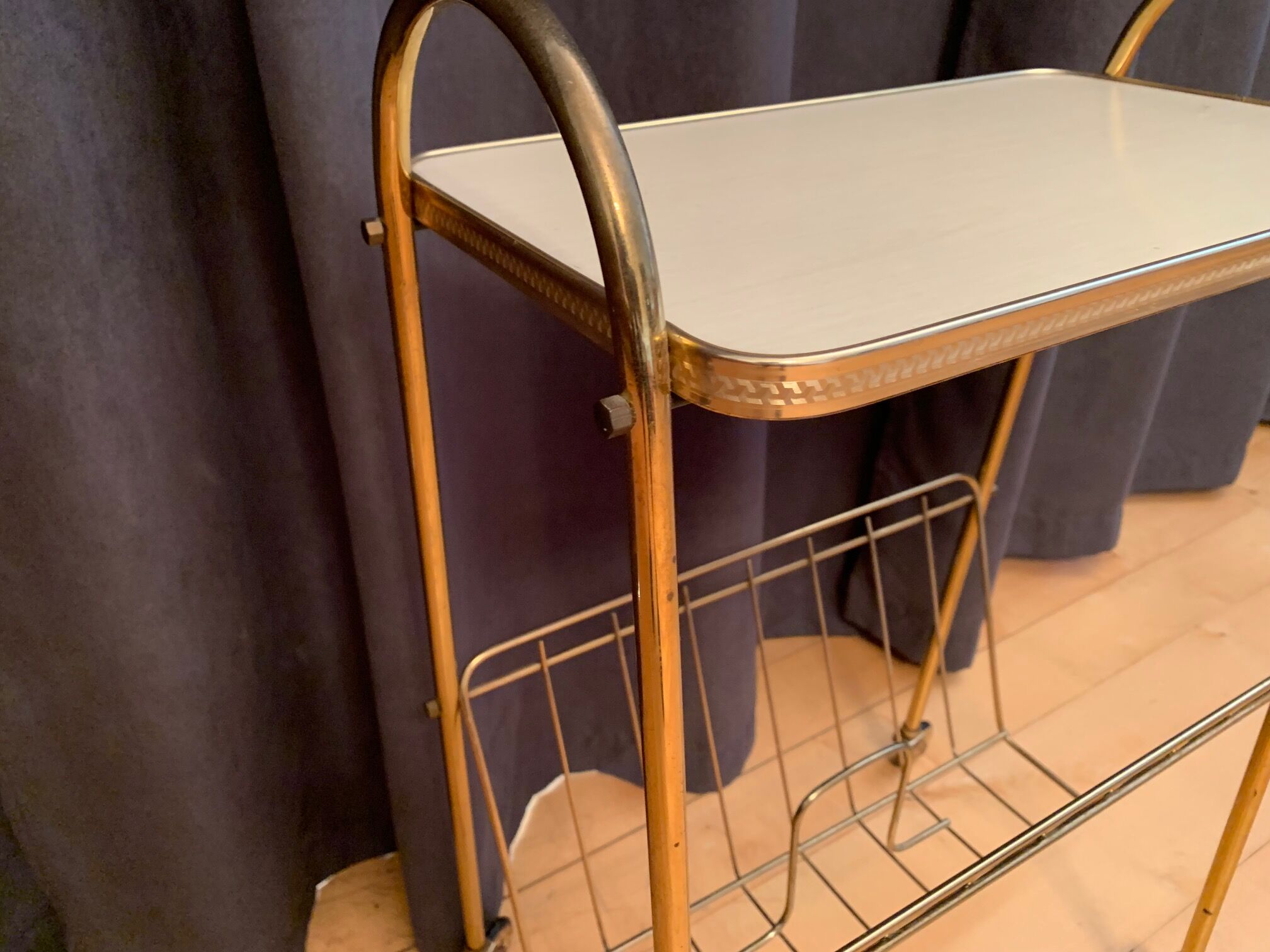 Mobile newspaper holder, 1960s