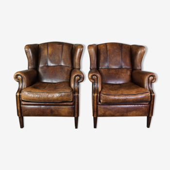 Set de 2 fauteuils en cuir de mouton