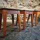 Set of 3 vintage French wooden stools from the 1950s.