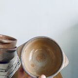 Three bowls in ancient sandstone