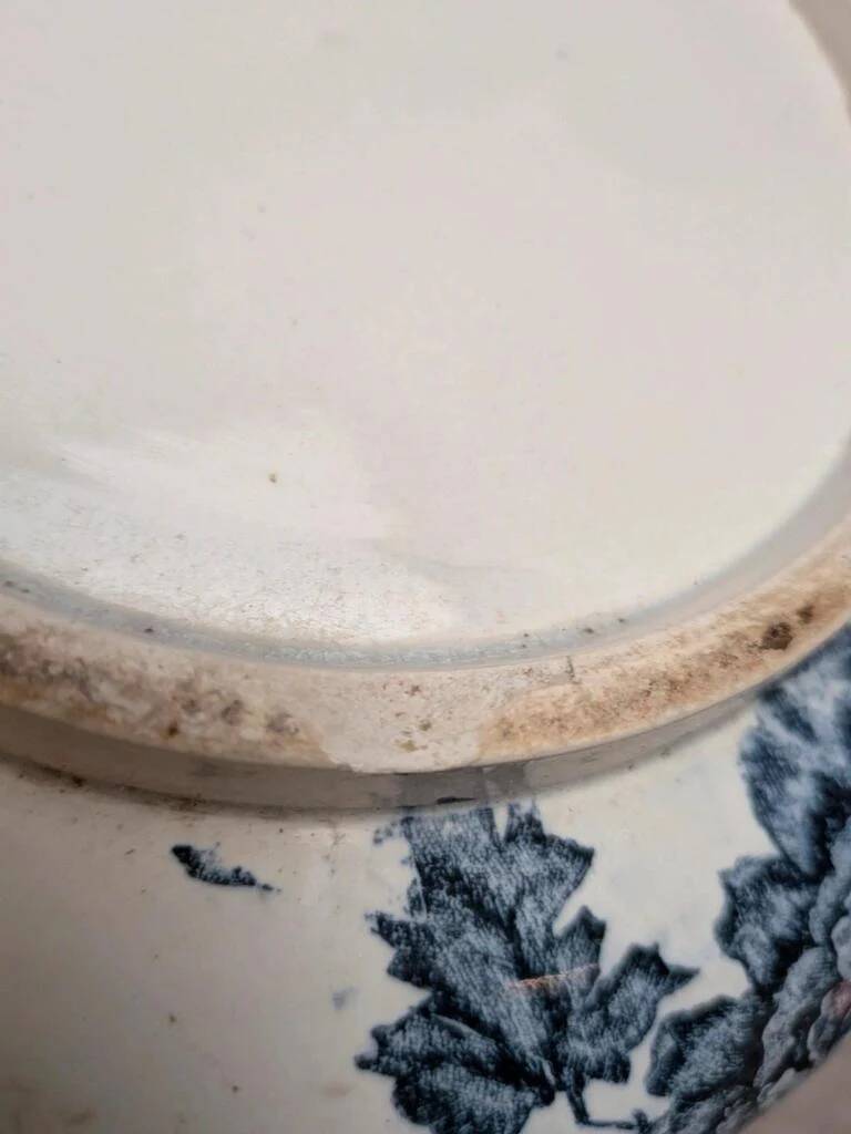 Small chubby antique jug in ironstone – blue floral decoration