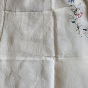 Antique linen tablecloth embroidered with flowers