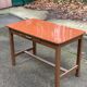 Parisian desk made of solid wood, painted grey and with formica.