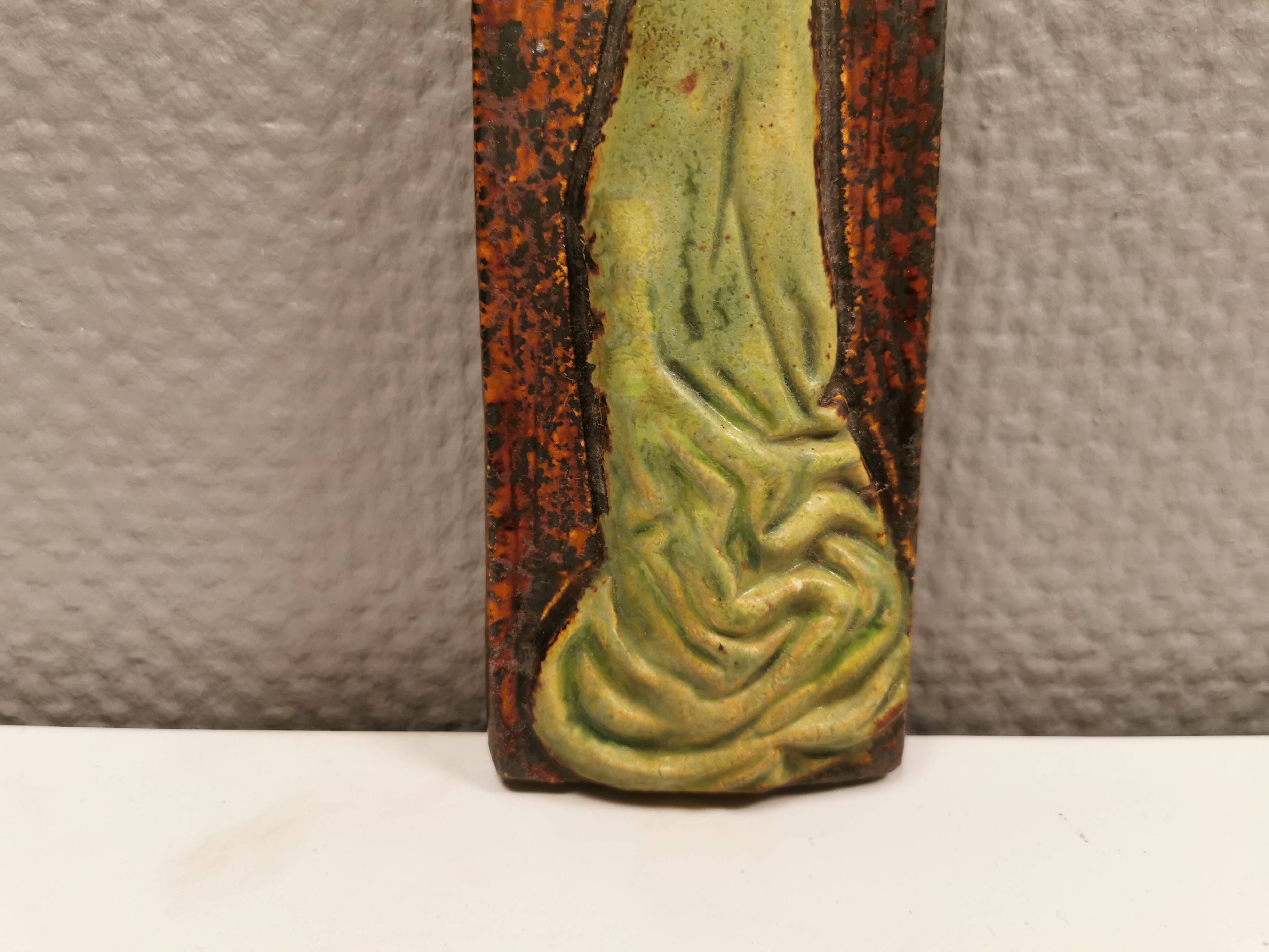 Slim relief with a motif of Madonna and child.