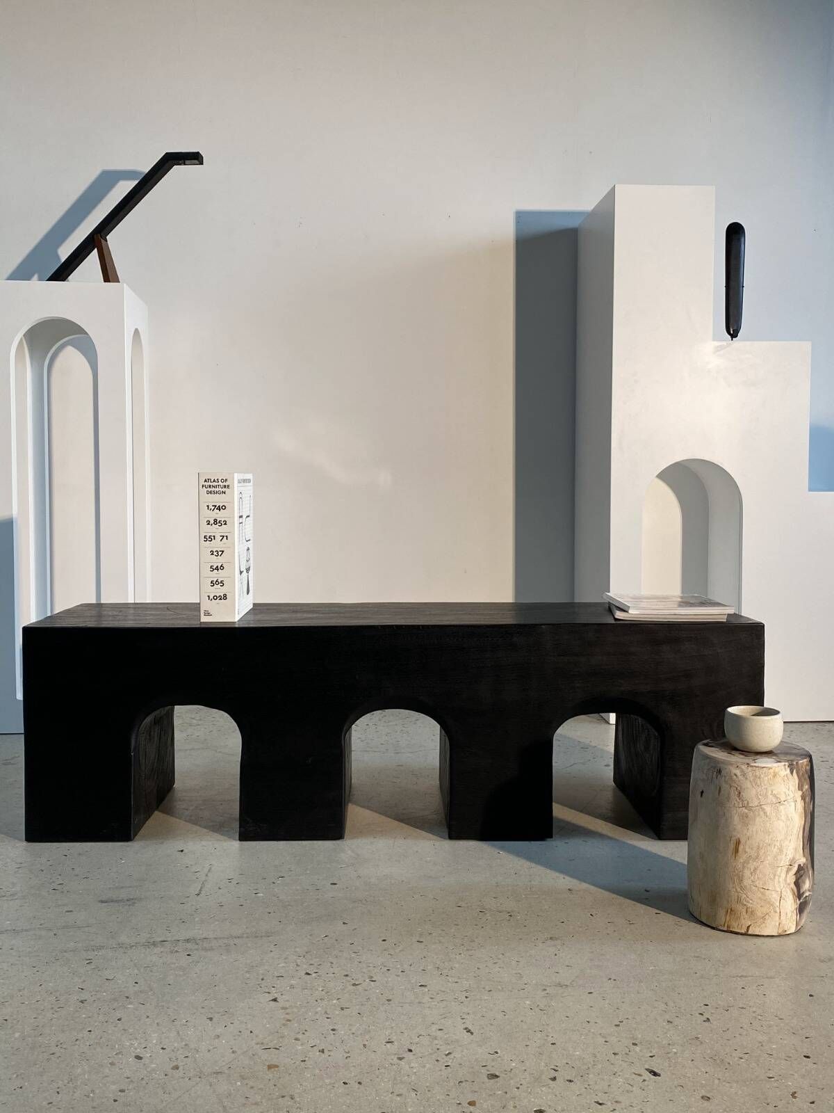 Bench in solid monoxyl wood, carved base in 3 arches - Black color