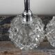 Paire d’appliques chromées et verre ciselé