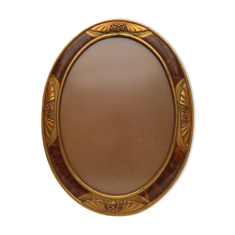 Oval art nouveau frame in wood, flamed and gold décor
