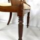 Pair of English mahogany armchairs from the 19th century – Regency style