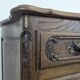 Commode néo rustique galbée richement sculptée
