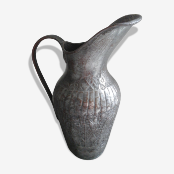 Old metal pitcher vase