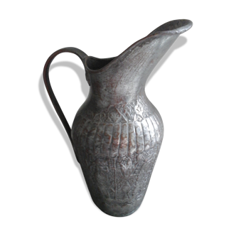 Old metal pitcher vase